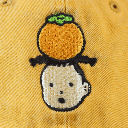 Persimmon Girl Yellow Hat